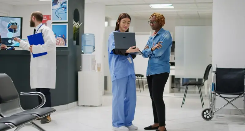 Clinical staff consulting in a modern hospital