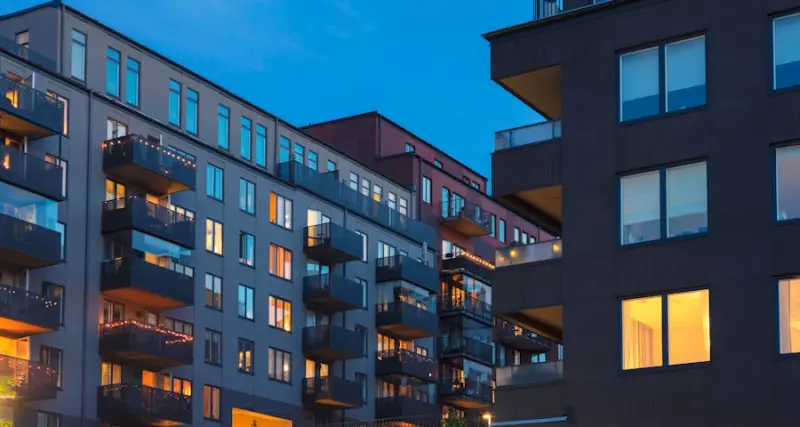 Modern residential apartment buildings at dusk
